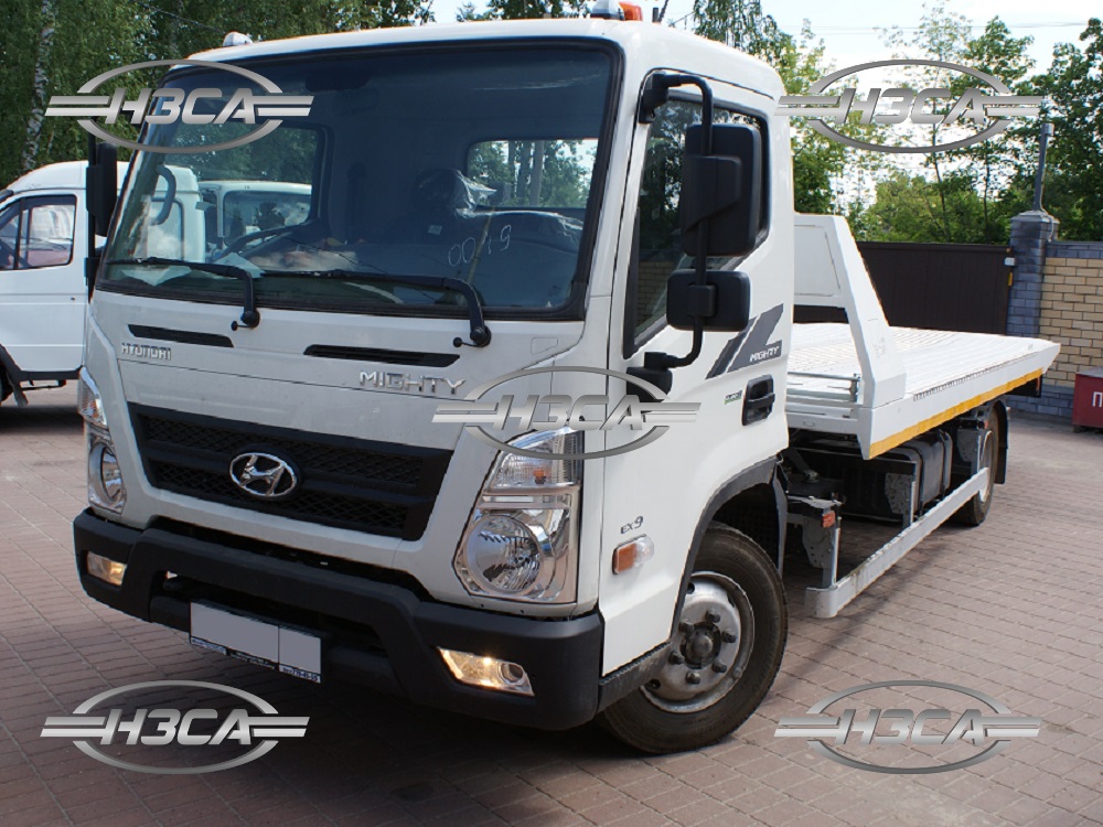 Эвакуатор Hyundai Mighty со сдвижной платформой и брилем