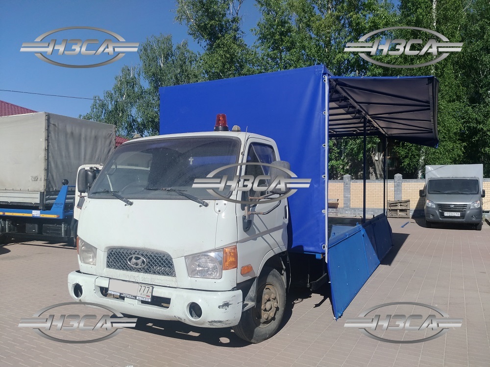 Эвакуатор Hyundai HD-78 с ломаной платформой, каркас, откидной борт, сдвижная крыша, тент