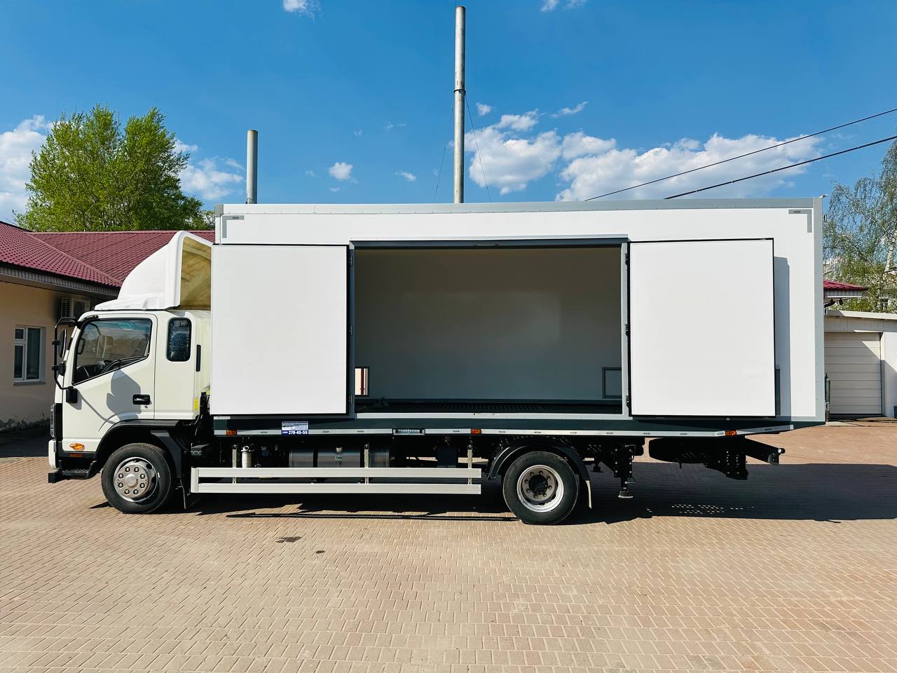 Крытый эвакуатор со cдвижной платформой на базе JAC 120