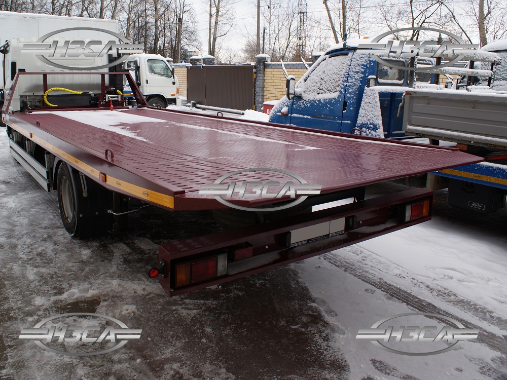 Эвакуатор Isuzu 90 со сдвижной платформой
