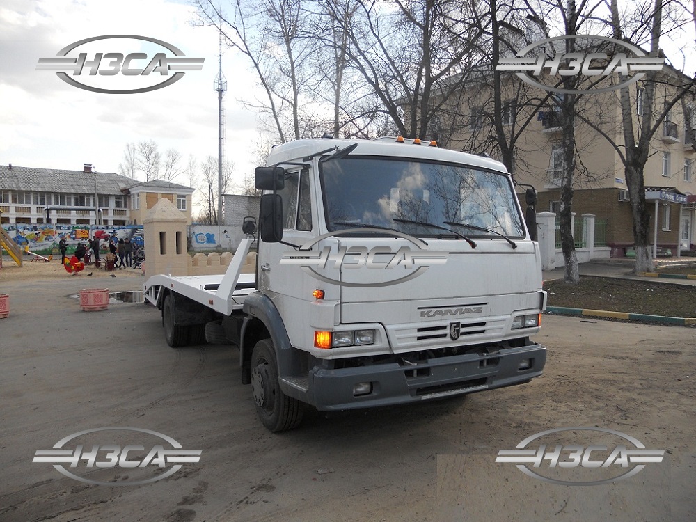 Эвакуатор КАМАЗ-4308 с ломаной платформой