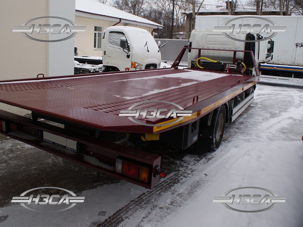 Эвакуатор Isuzu 90 со сдвижной платформой